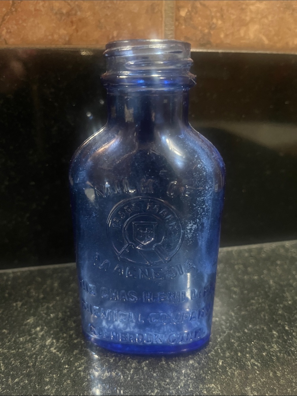 Cobalt Blue Embossed Milk of Magnesia Glass Bottle